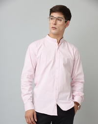 Man wearing a light pink shirt