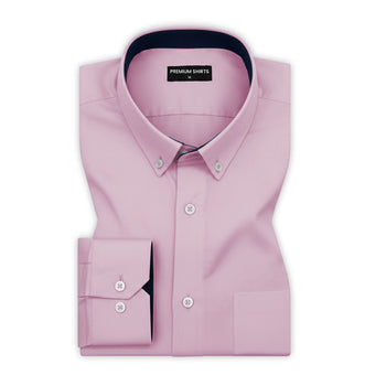 Pink dress shirt with Navy blue collar and cuff on a white background