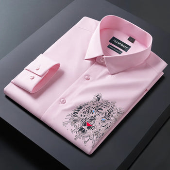 Pink dress shirt with a tiger embroidery on a dark surface