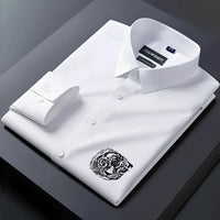 White dress shirt with a tiger emblem on a dark background