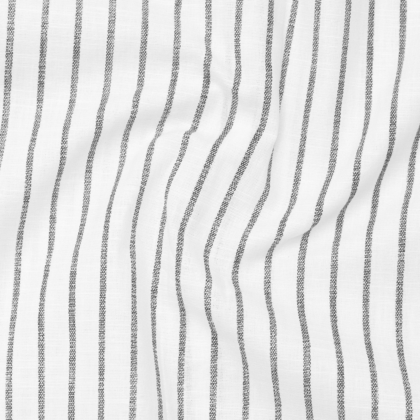 Close-up of fabric with wavy black stripes on a white background