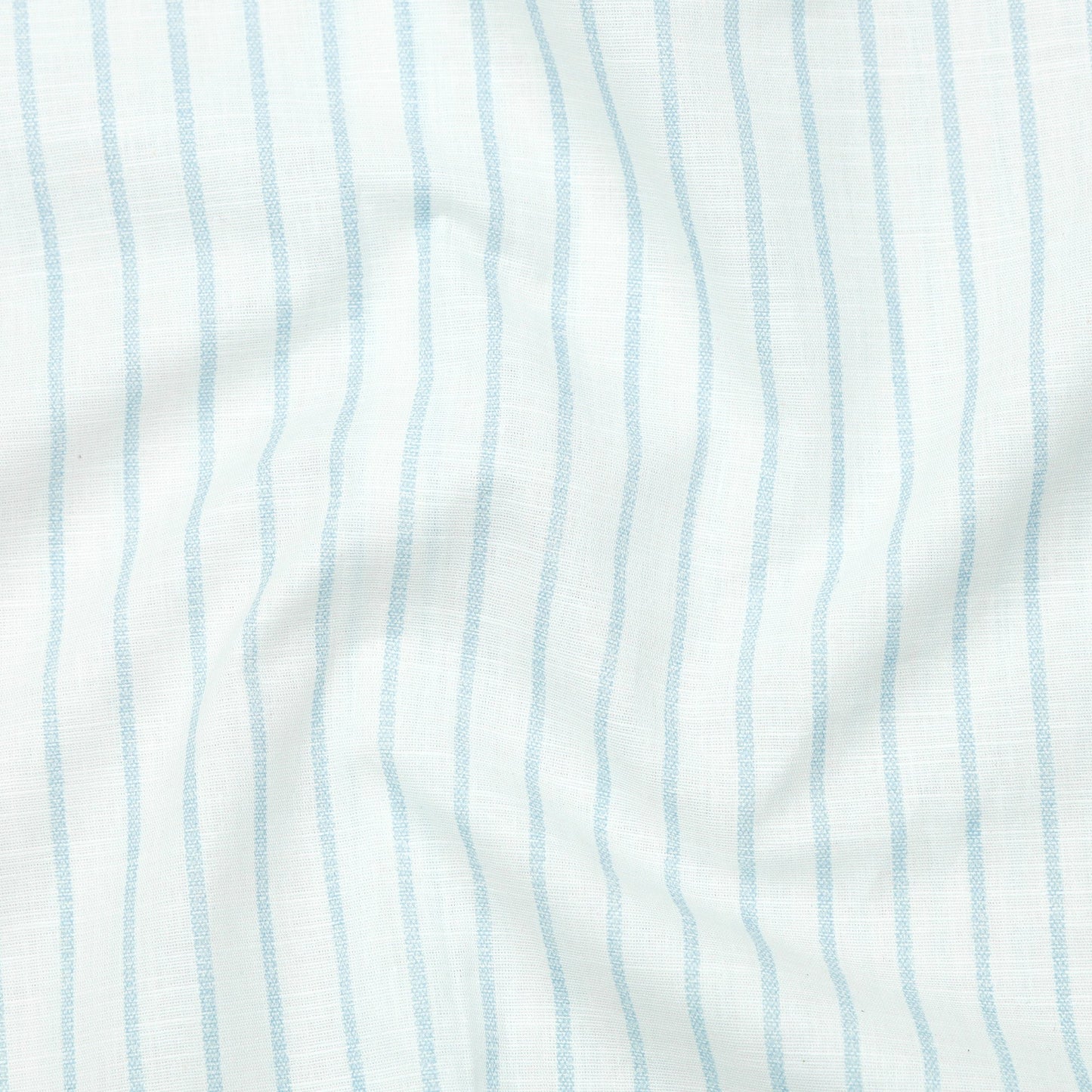 Close-up of fabric with light blue vertical stripes on a white background