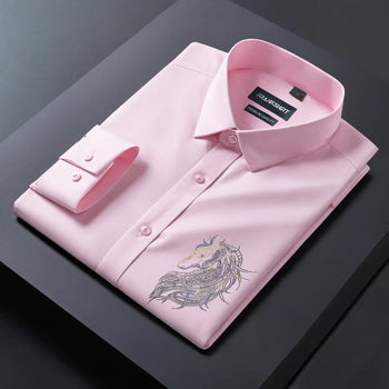 Pink dress shirt with embroidery on a dark surface