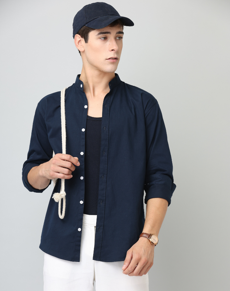 Man wearing a navy Shirt