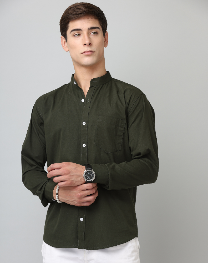 Man wearing a dark green shirt