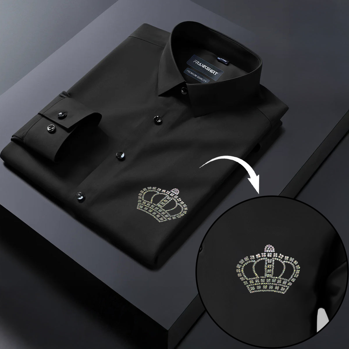 Black dress shirt with a crown emblem on a dark background