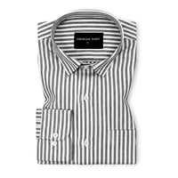 Folded black and white striped shirt with a visible brand label on a white background