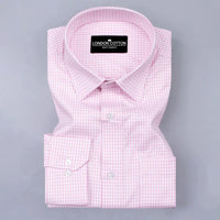 Pink checkered dress shirt with 'London Cotton' label on a gray background