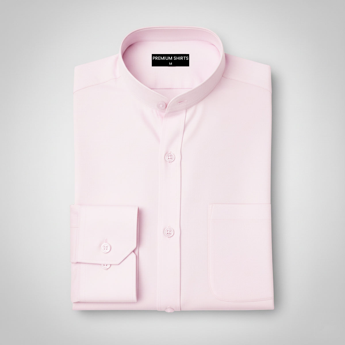 Folded light pink shirt on a gray background with 'Premium Shirts' label.