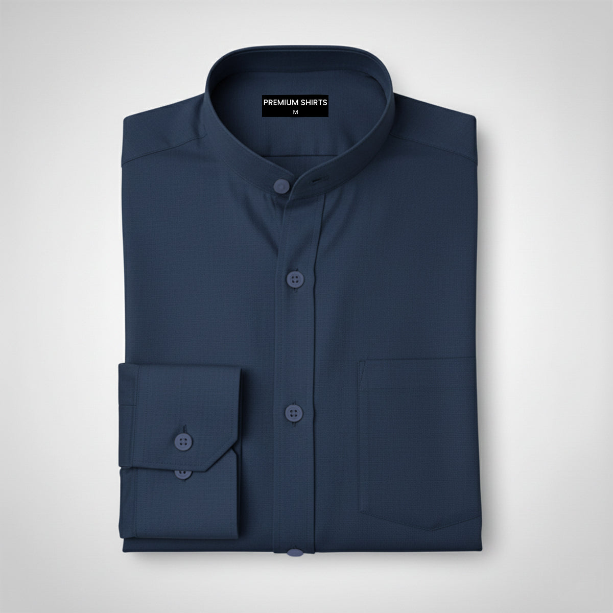 Folded navy blue shirt on a light gray background