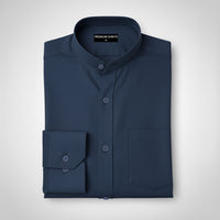 Folded navy blue shirt on a light gray background