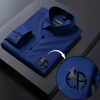 Blue dress shirt with a deer emblem on a dark background