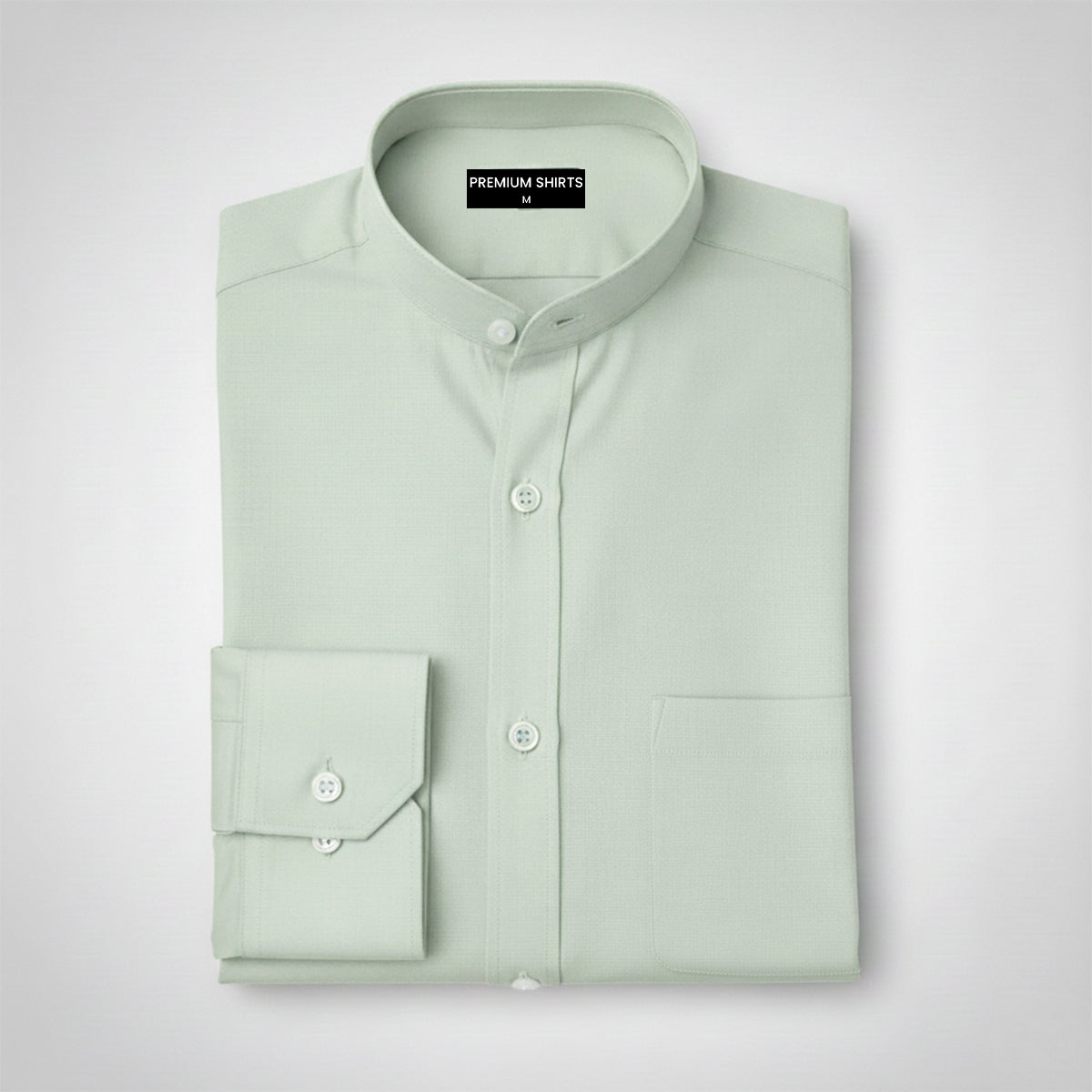 Folded light green shirt on a white background with 'Premium Shirts' label.