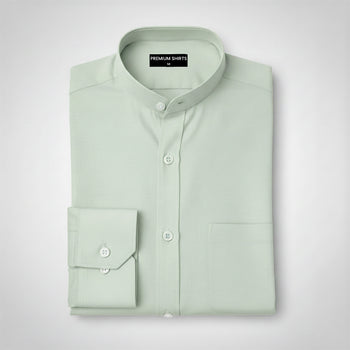 Folded light green shirt on a white background with 'Premium Shirts' label.