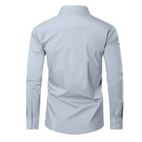 Silver dress shirt back side on a white background