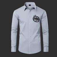 Gray dress shirt with a logo on a black background