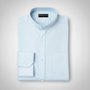 Folded light blue shirt on a gray background with 'Premium Shirts' label.